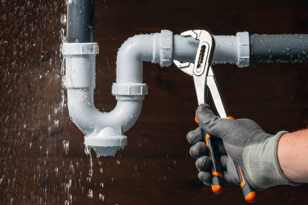 Professional Drain Cleaning technician working in Russell, IL